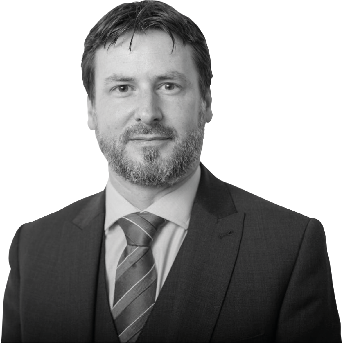 A black and white image of a man looking at the camera from the chest up. He has short brown hair and is wearing a suit and tie.