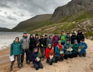 Young Park Rangers at Loch Avon in the Cairngorms. Senior Rangers Pete Short and Will George are present.