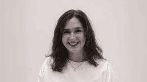 photo of person with long hair smiling